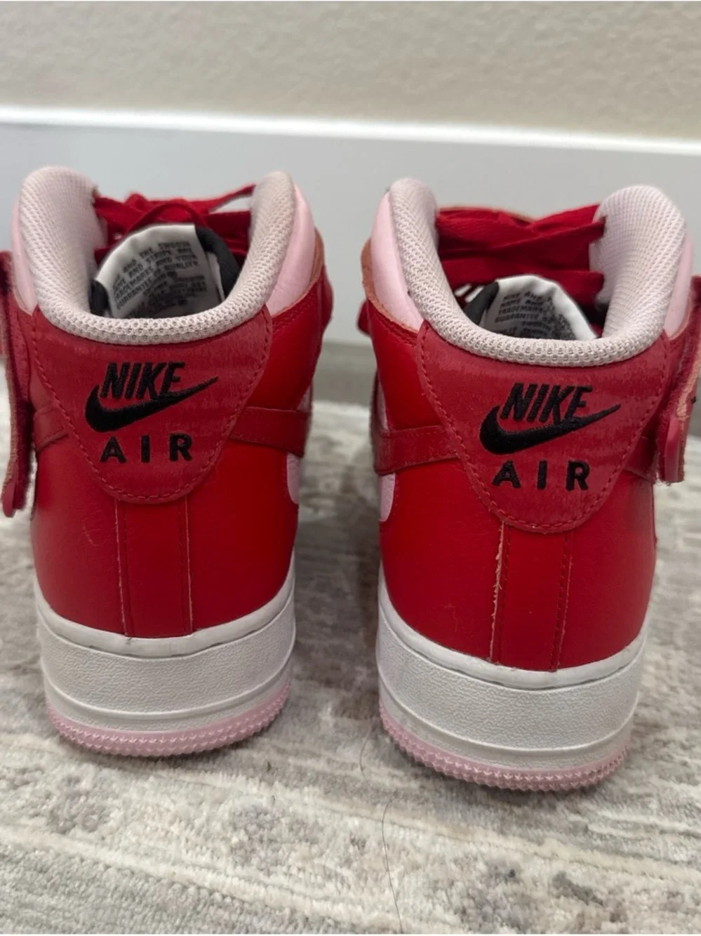 Nike Air Force 1 Pink and Red Black-Accented High-Top Sneakers